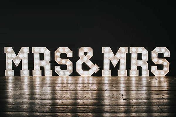 MRS & MRS illuminated wedding letters with LED lighting, ideal for same-sex weddings and celebratory photo setups.