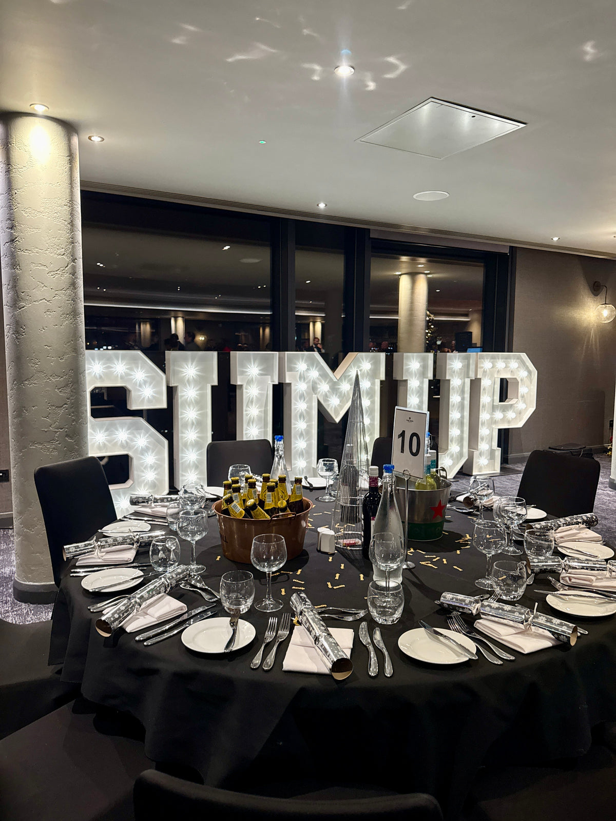 SUMUP branded light up letters at a corporate product launch event
