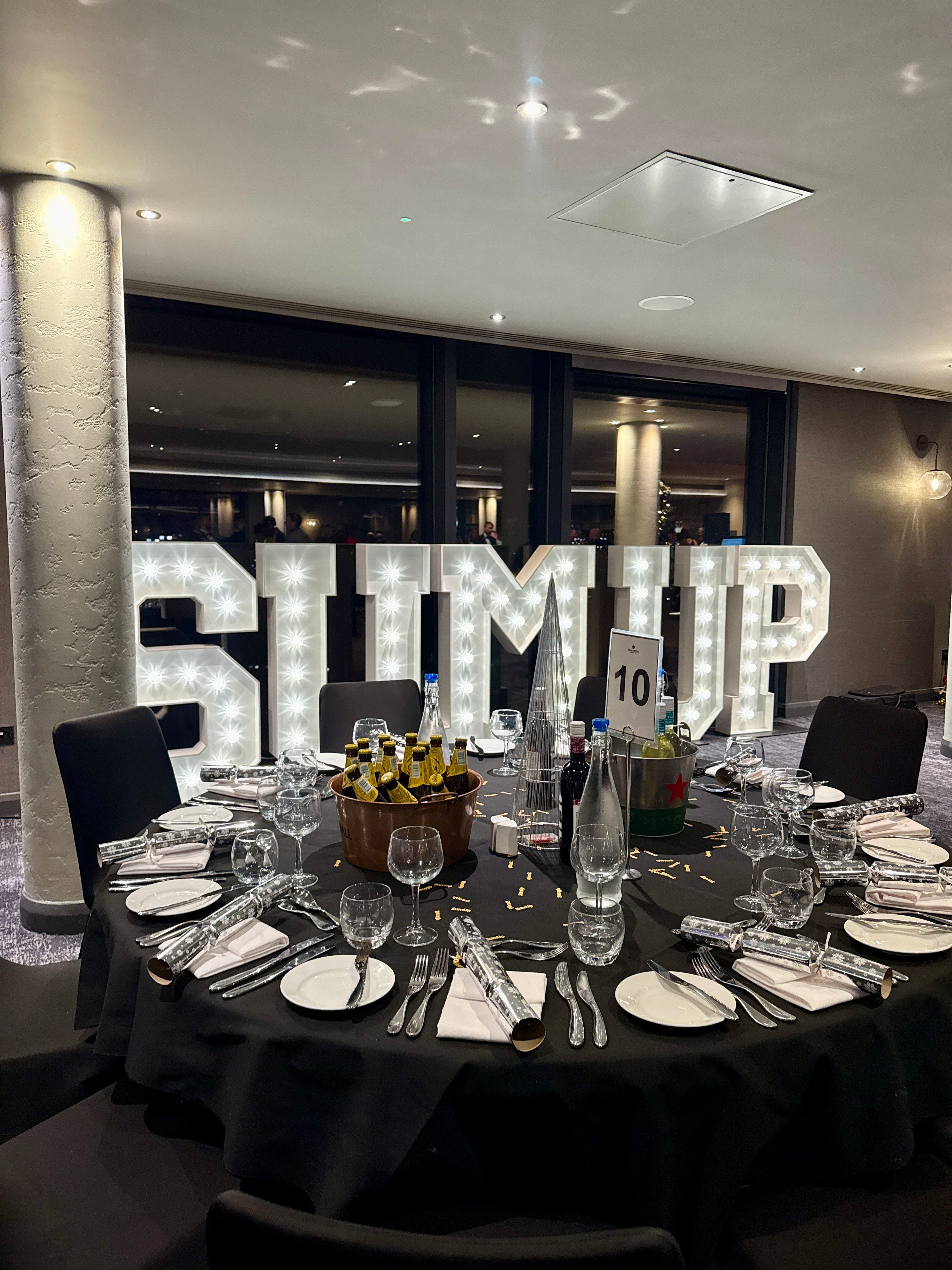 SUMUP branded light up letters at a corporate product launch event