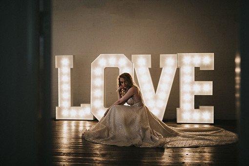 Large 5ft light up letters displayed at a wedding venue, illuminated with warm white LED bulbs – perfect for creating standout photo moments.