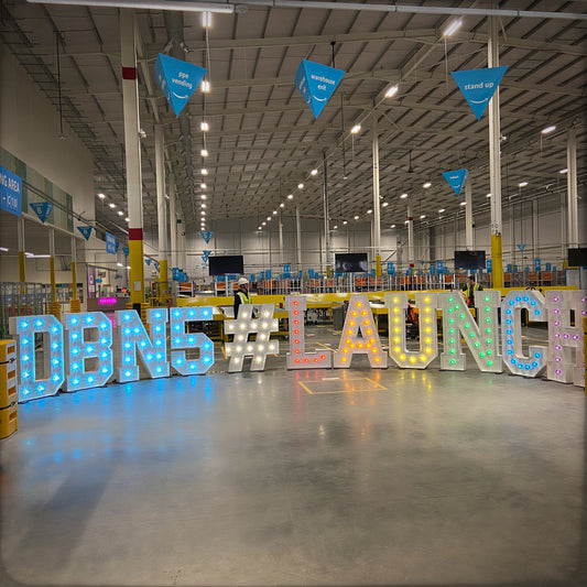 Custom light up letters for product launch event spelling DBN5#LAUNCH with multi-colour LEDs